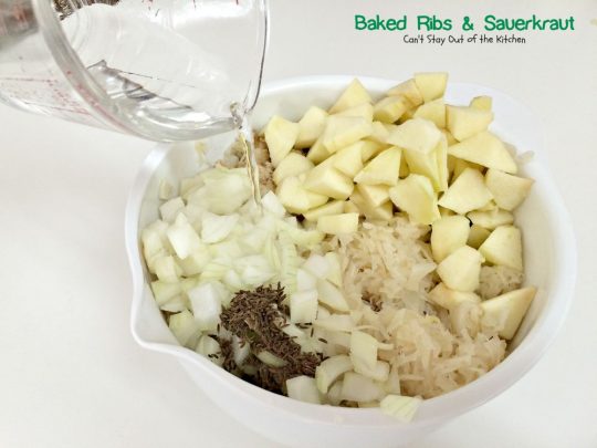 Baked Ribs & Sauerkraut | Can't Stay Out of the Kitchen | wonderful old-world recipe. The #sauerkraut is mixed with #apples, onions, brown sugar and caraway seeds for delightful taste. #pork #ribs