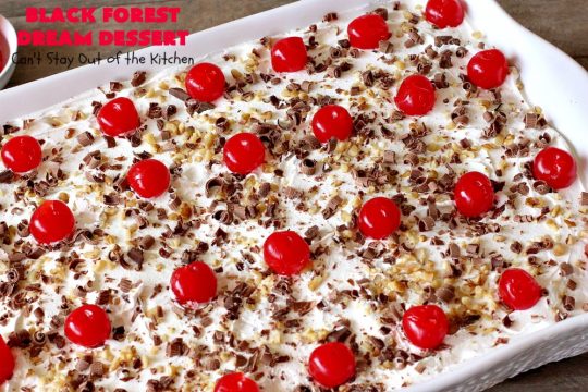 Black Forest Dream Dessert | Can't Stay Out of the Kitchen | this spectacular #dessert has a crust layer with #pecans & #coconut. It also has #cheesecake layer, a #cherrypiefilling layer, a vanilla pudding layer with melted #chocolatechips added, & a top layer with #CoolWhip, #maraschinocherries, #chocolate curls & chopped #pecans. Absolutely divine! #BlackForestDessert #CherryDessert #ChocolateDessert #ValentinesDay #ValentinesDayDessert #ChristmasDessert #CheesecakeDessert