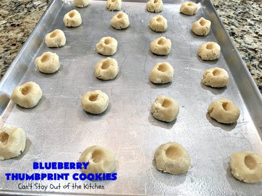 Blueberry Thumbprint Cookies | Can't Stay Out of the Kitchen | these festive & beautiful #Christmas #cookies will have you salivating after the first bite. Perfect for #holiday parties like Christmas & #NewYearsDay. #dessert #blueberries #cookies #HolidayDessert #BlueberryDessert #ChristmasCookieExchange #ChristmasCookie