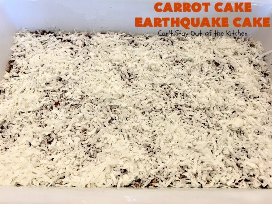 Carrot Cake Earthquake Cake | Can't Stay Out of the Kitchen | this fantastic #cake is rich, decadent & divine! It's layered with #pecans, #coconut, vanilla chips & uses a boxed #carrotcake mix. Then it has a #cheesecake icing layer that sinks into the #dessert while baking. The explosion causes an earthquake! Amazing dessert for company or #holidays.