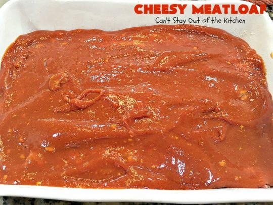 Cheesy Meatloaf | Can't Stay Out of the Kitchen | This amazing #meatloaf is filled with #cheddarcheese & topped with a #ketchup, mustard & brown sugar topping. This #glutenfree #entree uses #oatmeal & GF bread crumbs. #beef #groundbeef