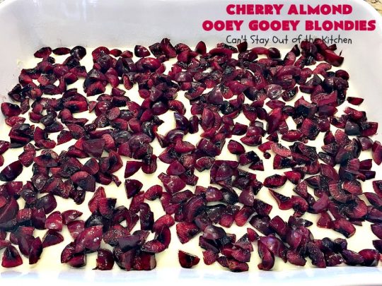 Cherry Almond Ooey Gooey Blondies | Can't Stay Out of the Kitchen | Best #cherry #dessert ever! These fabulous #cookies have a #cheesecake filling, topped with fresh #cherries & powdered sugar. They are absolutely heavenly. #almonds #cherrydessert #Canbassador #NorthwestCherryGrowers