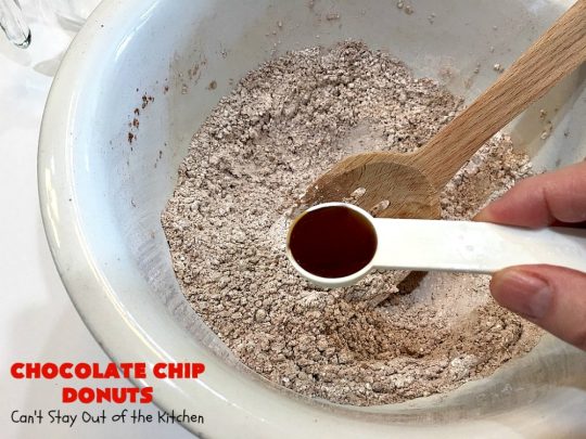Chocolate Chip Donuts | Can't Stay Out of the Kitchen | these spectacular #donuts are filled with miniature #ChocolateChips. They're glazed with a #chocolate icing and sprinkled with chocolate #sprinkles on top. Mouthwatering #breakfast for #holidays like #MothersDay or #FathersDay. #HolidayBreakfast #FathersDayBreakfast #MothersDayBreakfast #ChocolateChipDonuts