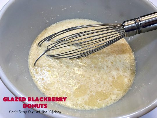Glazed Blackberry Donuts | Can't Stay Out of the Kitchen | these #donuts are absolutely heavenly. They're filled with #blackberries & glazed with a luscious vanilla glaze. Perfect for a #holiday, company or weekend #breakfast. #HolidayBreakfast #BlackberryDonuts #BakedDonuts