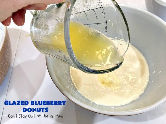Glazed Blueberry Donuts | Can't Stay Out of the Kitchen | if you want to wow your family & friends, make these heavenly #blueberry #donuts for #breakfast. They're absolutely spectacular. #Holiday #HolidayBreakfast #CompanyBreakfast #BlueberryDonuts #GlazedBlueberryDonuts 