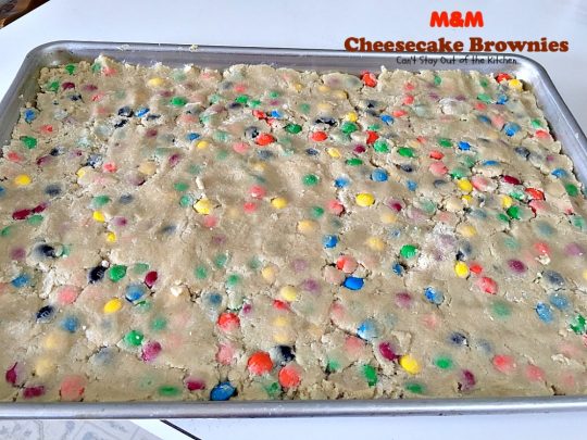 M&M Cheesecake Brownies | Can't Stay Out of the Kitchen | this fantastic #brownie is to die for! A luscious #cheesecake layer is sandwiched between 2 layers of M&M #cookiedough and topped with more #M&Ms. Absolutely divine! #dessert