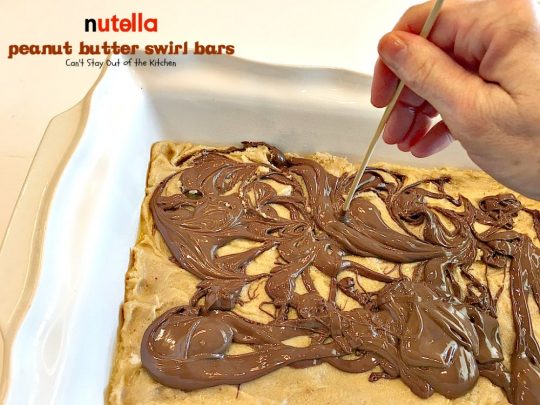 Nutella Peanut Butter Swirl Bars | Can't Stay Out of the Kitchen | these fantastic #brownies use a #peanutbutter #cookie dough with #Nutella swirled into the batter. This #dessert is heavenly! #tailgating
