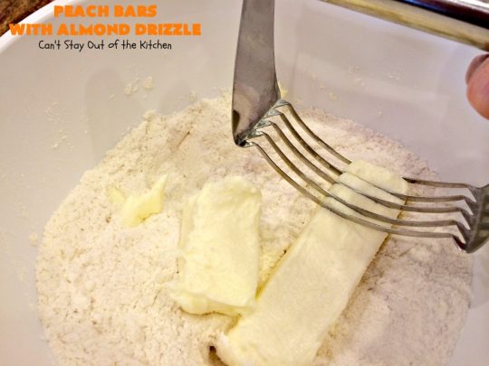 Peach Bars with Almond Drizzle | Can't Stay Out of the Kitchen | this heavenly #dessert uses fresh #peaches, has a streusel topping & glazed with #almond icing. Perfect #dessert for #LaborDay or other summer holidays. 