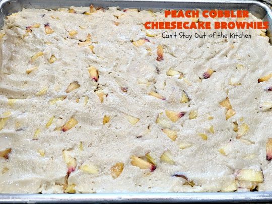 Peach Cobbler Cheesecake Brownies | Can't Stay Out of the Kitchen | these spectacular #brownies start with a #peachcobbler #cookie dough. They have a luscious #cheesecake filling in the middle, topped with fresh #peaches. Then more cookie dough is crumbled over top. These were a huge hit at my husband's office. #dessert #peachdessert #CANbassador #WashingtonStateFruitCommission #WashingtonStatestoneFruitGrowers