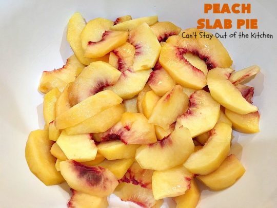 Peach Slab Pie | Can't Stay Out of the Kitchen | This #peachpie #recipe is spectacular. It's the perfect treat for #summer #holiday fun or #fall baking when fresh #peaches are still in season. Everyone raved over this #dessert. #peachdessert #CANbassador #WashingtonStateFruitCommission #WashingtonStateStoneFruitGrowers