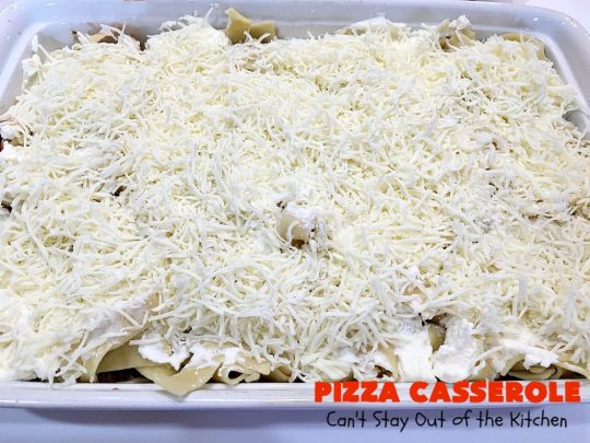 Ten Layer Pizza Casserole | Can't Stay Out of the Kitchen | This fantastic #casserole tastes like eating #pizza or #lasagna. It's filled with #GroundBeef, #noodles, #pepperoni #RicottaCheese, #Mozzarella Cheese & amped up #SpaghettiSauce. Our company raved over this #Italian #MainDish. #PizzaCasserole #TenLayerPizzaCasserole