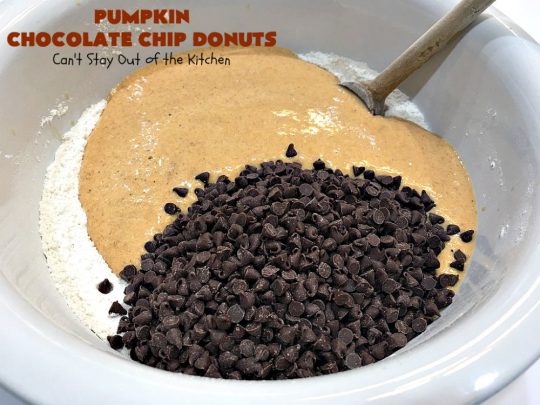 Pumpkin Chocolate Chip Donuts | Can't Stay Out of the Kitchen | these phenomenal #donuts are so mouthwatering. They have double the #chocolate & double the #pumpkin flavor. You'll be drooling over every mouthful. Highly recommended for #MothersDay or #FathersDay #Breakfast. #Holiday #HolidayBreakfast #PumpkinDonuts #ChocolateChipDonuts #fall #FallBaking #PumpkinChocolateChipDonuts #ChocolateChips