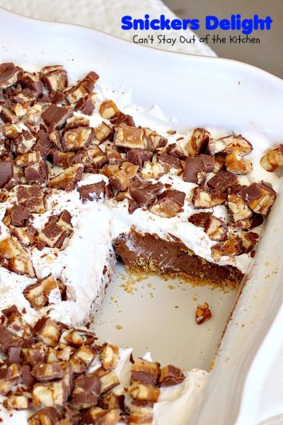 Snickers Delight | Can't Stay Out of the Kitchen | fantastic #icecream #dessert with a graham cracker crust, a #snickers ice cream & #chocolate pudding layer & topped with chopped Snickers bars. This will become your favorite dessert!