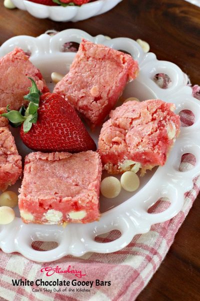 Strawberry White Chocolate Gooey Bars | Can't Stay Out of the Kitchen | these incredibly gooey #brownies are so easy & delicious. They start with a #strawberry #cakemix & are filled with #whitechocolatechips & sweetened #condensedmilk. #dessert #cookie #chocolate