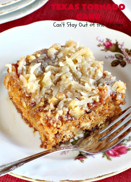 Texas Tornado Cake | Can't Stay Out of the Kitchen | this quick & easy #cake #recipe looks like a tornado hit it after baking! It's filled with #walnuts and #FruitCocktail. The #caramelized icing contains #coconut. This vintage cake will knock your socks off! #dessert #TexasTornadoCake #FruitCocktailCake #peaches #pears #EasyDessertRecipe #Holiday #HolidayDessert #ValentinesDay #ValentinesDayDessert