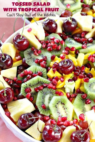 Tossed Salad with Tropical Fruit | Can't Stay Out of the Kitchen | This spectacular #salad is filled with #cherries #mangos #pineapple #kiwis & #pomegranates. Fantastic side dish for summer #holiday fun. #glutenfree #vegan