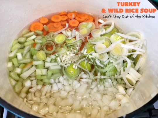 Turkey and Wild Rice Soup | Can't Stay Out of the Kitchen | this fantastic #soup is the perfect comfort food for the cold, dreary nights of winter. It will warm you up and put a smile on your face! #Turkey #TurkeySoup #TurkeyandWildRiceSoup #greenbeans #carrots #peas #WildRice #GlutenFree #mushrooms #Fall #FallSoupRecipe #GlutenFreeSoup #GlutenFreeTurkeySoup 
