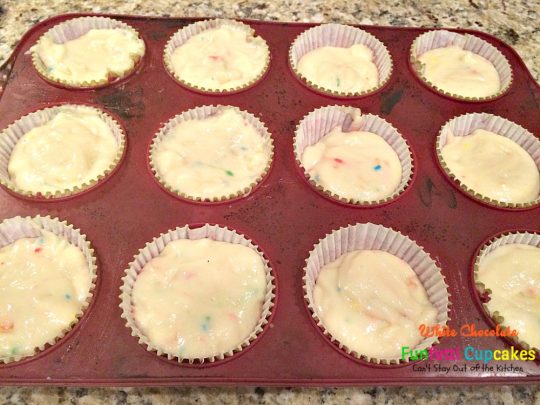 White Chocolate Funfetti Cupcakes | Can't Stay Out of the Kitchen | these fabulous #funfetti #cupcakes are filled with #whitechocolatechips and are so quick and easy to make. They're great for any #holiday party. #chocolate #dessert
