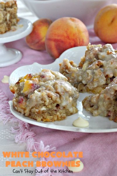 White Chocolate Peach Brownies | Can't Stay Out of the Kitchen | these fantastic #brownies are ooey, gooey decadent & divine! They're filled with #coconut, #walnuts, #peaches & white #chocolatechips. Then they're drizzled with white #chocolate icing. This #dessert is fantastic during the #summer when peaches are in season.