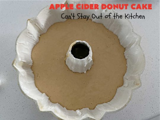 Apple Cider Donut Cake | Can't Stay Out of the Kitchen | You'll rave over every delectable bite of this amazing #AppleCake. #Applesauce & #AppleCider provide wonderful flavor, & the #cinnamon-sugar topping makes it taste like eating #AppleDonuts! Great for #breakfast or #dessert. #apples #donuts #EasyCakeMixRecipe #AppleDessert #AppleCiderDonutCake