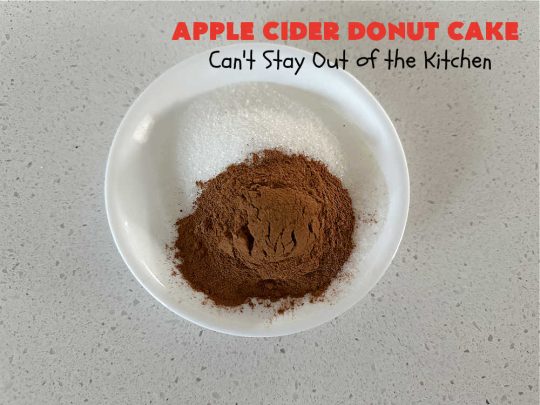Apple Cider Donut Cake | Can't Stay Out of the Kitchen | You'll rave over every delectable bite of this amazing #AppleCake. #Applesauce & #AppleCider provide wonderful flavor, & the #cinnamon-sugar topping makes it taste like eating #AppleDonuts! Great for #breakfast or #dessert. #apples #donuts #EasyCakeMixRecipe #AppleDessert #AppleCiderDonutCake