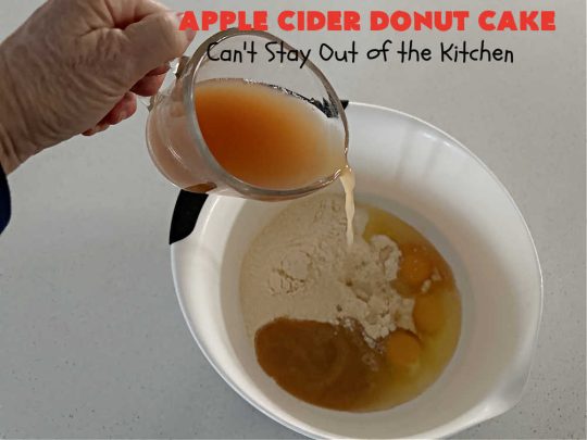 Apple Cider Donut Cake | Can't Stay Out of the Kitchen | You'll rave over every delectable bite of this amazing #AppleCake. #Applesauce & #AppleCider provide wonderful flavor, & the #cinnamon-sugar topping makes it taste like eating #AppleDonuts! Great for #breakfast or #dessert. #apples #donuts #EasyCakeMixRecipe #AppleDessert #AppleCiderDonutCake