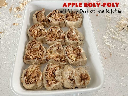 Apply Roly-Poly | Can't Stay Out of the Kitchen | #AppleRolyPoly is one of the best #desserts you'll ever sink your teeth into. This #cobbler-type #dessert rolls up like #PieCrust & is sliced into #pinwheels. It has a #cinnamon #syrup poured over top before #baking. The result has a #cake-like texture & is beyond spectacular. Excellent served with #IceCream. #apples #AppleDessert #AppleCobbler