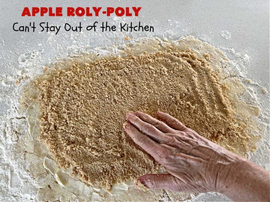 Apply Roly-Poly | Can't Stay Out of the Kitchen | #AppleRolyPoly is one of the best #desserts you'll ever sink your teeth into. This #cobbler-type #dessert rolls up like #PieCrust & is sliced into #pinwheels. It has a #cinnamon #syrup poured over top before #baking. The result has a #cake-like texture & is beyond spectacular. Excellent served with #IceCream. #apples #AppleDessert #AppleCobbler
