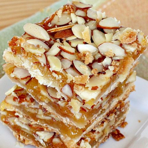 Apricot Almond Bars | Can't Stay Out of the Kitchen | these #cookie bars are fantastic. #Apricot preserves are layered on a shortbread crust and sprinkled with #almonds. We love to make these for the #holidays. #dessert