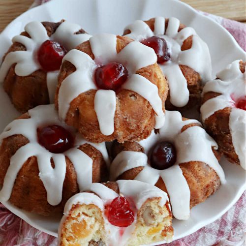 Apricot Tea Cakes | Can't Stay Out of the Kitchen | these fabulous #TeaCakes include #apricots, vanilla chips, #walnuts , glazed icing & a #cherry on top! Marvelous for #holiday or #Christmas parties. Festive, elegant, beautiful! #dessert #ApricotDessert #ApricotTeaCakes