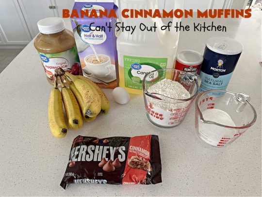 Banana Cinnamon Muffins | Can't Stay Out of the Kitchen | #Cinnamon flavor explodes in these lovely #muffins due to the addition of #CinnamonChips in the batter. They're sure to cure any sweet tooth craving although you may want seconds! #Applesauce & #bananas keep these #breakfast #muffins moist. Great choice for a weekday, company or #holiday #breakfast or #brunch. #BananaCinnamonMuffins