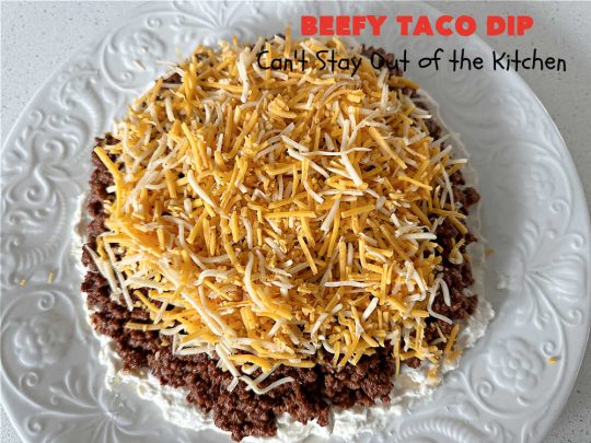 Beefy Taco Dip | Can't Stay Out of the Kitchen | #BeefyTacoDip is a sensational #TexMex #appetizer. This is a #LayeredDip with a #CreamCheese layer, a #GroundBeef layer with #TacoSeasoning & then it's topped with #lettuce, #tomatoes, #GreenOnions & #BellPeppers. Serve with #Fritos or #TortillaChips. Great for #tailgating parties, backyard barbecues or potlucks. #GlutenFree