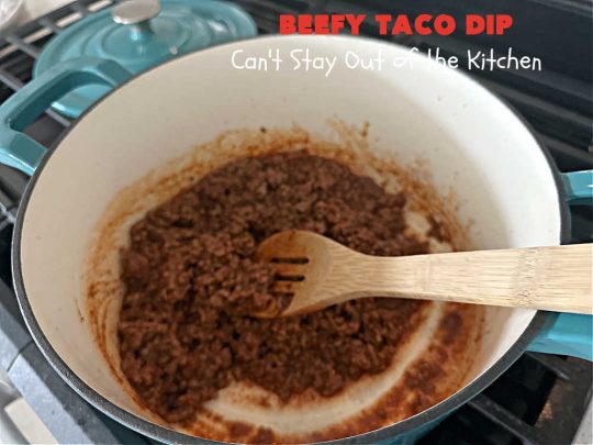 Beefy Taco Dip | Can't Stay Out of the Kitchen | #BeefyTacoDip is a sensational #TexMex #appetizer. This is a #LayeredDip with a #CreamCheese layer, a #GroundBeef layer with #TacoSeasoning & then it's topped with #lettuce, #tomatoes, #GreenOnions & #BellPeppers. Serve with #Fritos or #TortillaChips. Great for #tailgating parties, backyard barbecues or potlucks. #GlutenFree