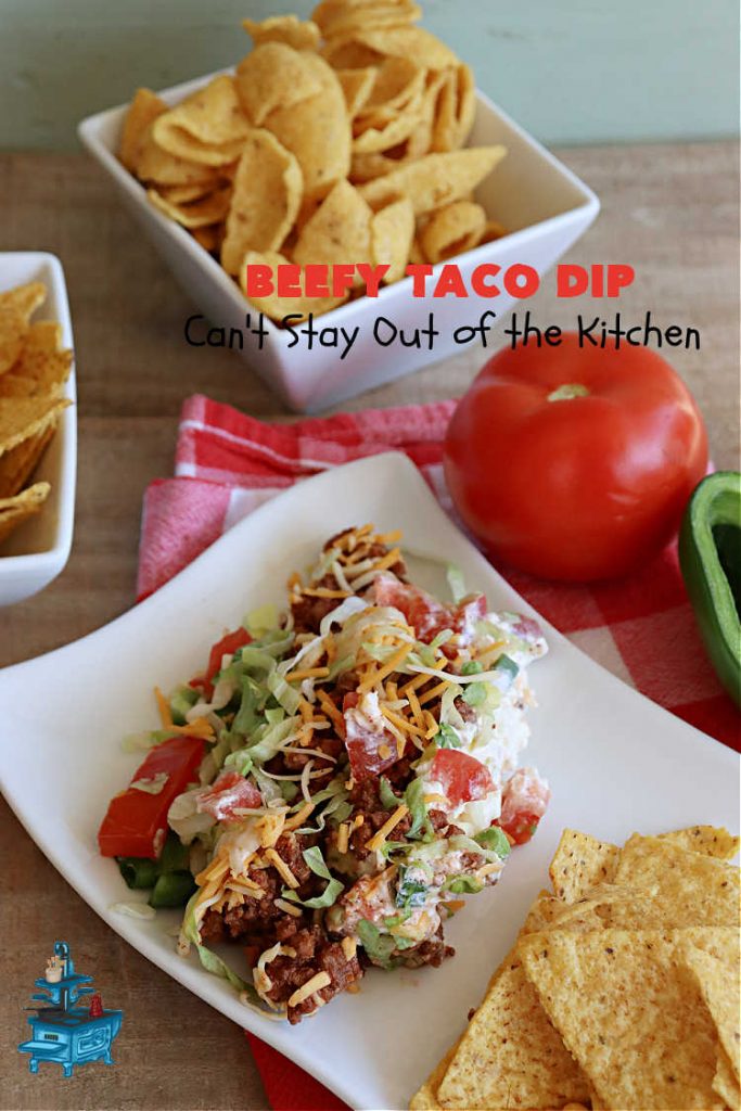 Beefy Taco Dip | Can't Stay Out of the Kitchen | #BeefyTacoDip is a sensational #TexMex #appetizer. This is a #LayeredDip with a #CreamCheese layer, a #GroundBeef layer with #TacoSeasoning & then it's topped with #lettuce, #tomatoes, #GreenOnions & #BellPeppers. Serve with #Fritos or #TortillaChips. Great for #tailgating parties, backyard barbecues or potlucks. #GlutenFree