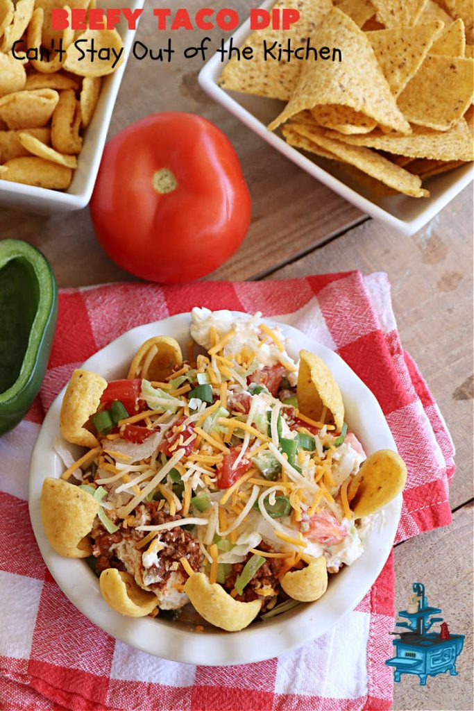 Beefy Taco Dip | Can't Stay Out of the Kitchen | #BeefyTacoDip is a sensational #TexMex #appetizer. This is a #LayeredDip with a #CreamCheese layer, a #GroundBeef layer with #TacoSeasoning & then it's topped with #lettuce, #tomatoes, #GreenOnions & #BellPeppers. Serve with #Fritos or #TortillaChips. Great for #tailgating parties, backyard barbecues or potlucks. #GlutenFree