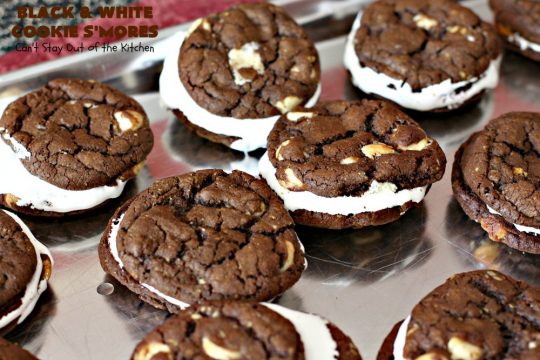 Black and White Cookie S'Mores | Can't Stay Out of the Kitchen | this fantastic #PaulaDeen #recipe includes #chocolate bars, #GrahamCrackers and #WhiteChocolateChips in the #cookie. Each one is put together with #MarshmallowCreme. These are the ultimate in #SmoresCookie! Great for #holiday #baking & #ChristmasCookieExchanges too. #Smores #dessert #SmoresDessert #BlackAndWhiteCookieSMores
