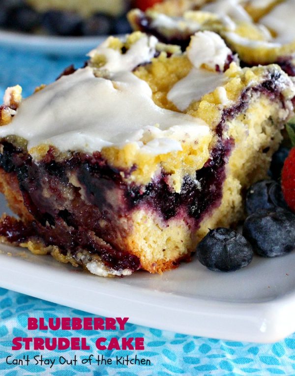 Blueberry Strudel Cake | Can't Stay Out of the Kitchen | this spectacular #cake is divine! The crust layer is made with a boxed #cakemix. It's topped with #Blueberrypiefilling, a streusel layer & glazed with an #almond flavored icing. Terrific #dessert for #Easter or #MothersDay. #BlueberryStrudelCake #BlueberryCake #BlueberryDessert #Coffeecake #breakfast #HolidayBreakfast #BlueberryCoffeecake