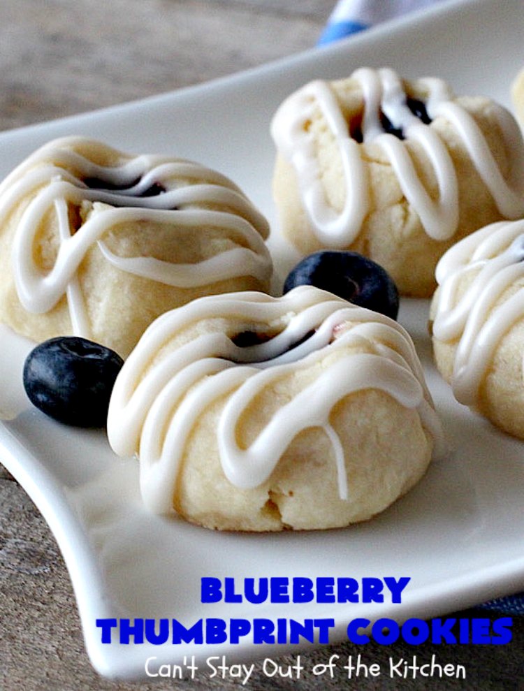 Blueberry Thumbprint Cookies | Can't Stay Out of the Kitchen | these festive & beautiful #Christmas #cookies will have you salivating after the first bite. Perfect for #holiday parties like Christmas & #NewYearsDay. #dessert #blueberries #cookies #HolidayDessert #BlueberryDessert #ChristmasCookieExchange #ChristmasCookie
