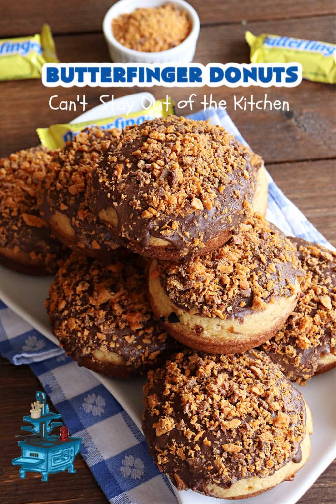 Butterfinger Donuts | Can't Stay Out of the Kitchen | Prepare to swoon over every delicious bite of #ButterfingerDonuts! These luscious #donuts include #Butterfingers in the donut as well as on top of the #ChocolateFrosting. Every bite will rock your world! Terrific for a weekend, company or #holiday breakfast or #brunch. #HolidayBreakfast #BakedDonuts #ButterfingerCandyBars