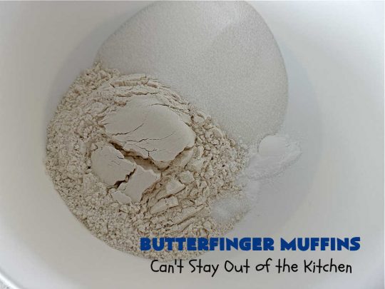Butterfinger Muffins | Can't Stay Out of the Kitchen | these sensational #muffins will knock your socks off! Every bite is filled with #Butterfingers so you'll taste plenty of #chocolate & #PeanutButter. Your family & friends will swoon over this fantastic #breakfast treat. #holiday #HolidayBreakfast #ButterfingerCandyBars #brunch #ButterfingerMuffins