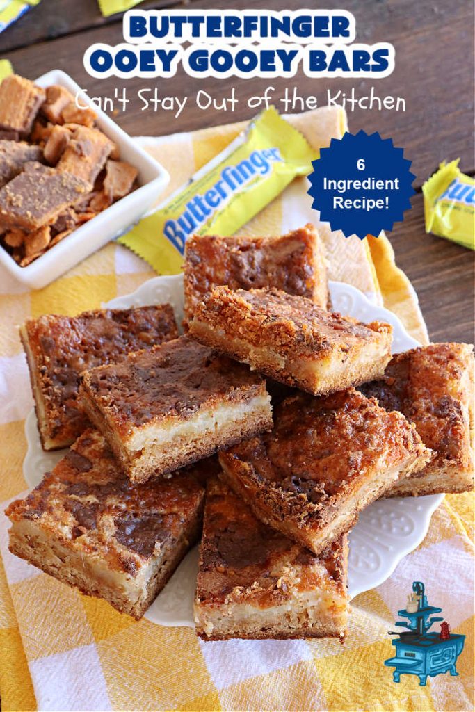 Butterfinger Ooey Gooey Bars | Can't Stay Out of the Kitchen | these lovely #OoeyGooeyBars include a #Cheesecake filling with chopped #Butterfingers on top! This easy 6-ingredient #recipe is so irresistible everyone will want seconds. They are out of this world good & will have you swooning from the first bite. Excellent for #tailgating, potlucks & a #ChristmasCookieExchange. #cookie #brownie #dessert #ButterfingerDessert #ButterfingerOoeyGooeyBars
