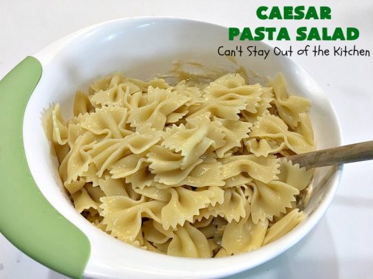 Caesar Pasta Salad | Can't Stay Out of the Kitchen | this is a terrific variation on traditional #CaesarSalad #recipes that includes bow-tie #pasta & a quick & easy homemade #SaladDressing. Great for potlucks & backyard BBQs. #salad #PastaSalad #ParmesanCheese #CaesarPastaSalad