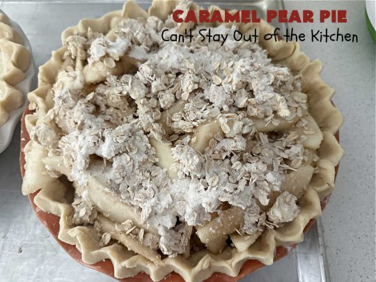 Caramel Pear Pie | Can't Stay Out of the Kitchen | this luscious #PearPie #recipe includes a layer of melted #caramels, #pecans & an #oatmeal #streusel topping that's totally scrumptious. Prepare to swoon over every bite. If you thought #CandiedApples were great, try this #pie version with #pears. Great for #holidays & company. #dessert #PearDessert #CaramelPearPie