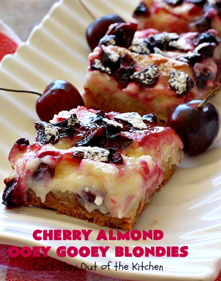 Cherry Almond Ooey Gooey Blondies | Can't Stay Out of the Kitchen | Best #cherry #dessert ever! These fabulous #cookies have a #cheesecake filling, topped with fresh #cherries & powdered sugar. They are absolutely heavenly. #almonds #cherrydessert #Canbassador #NorthwestCherryGrowers