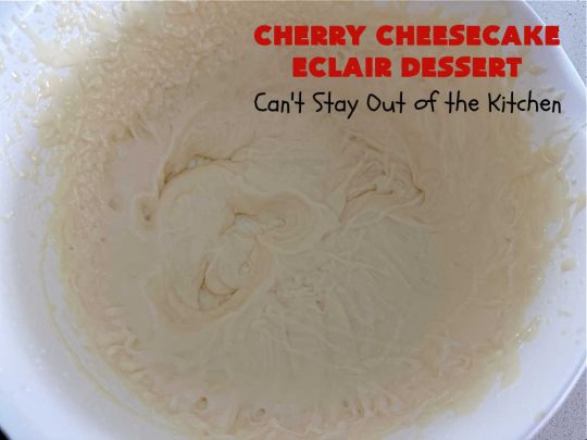 Cherry Cheesecake Éclair Dessert | Can't Stay Out of the Kitchen | this is an awesome #dessert to wow your family, friends and company for any social gathering. It's a #SixIngredientRecipe & easily whipped up in about 10 minutes. This #CherryDessert will have you swooning from the first bite. #ÉclairDessert #CherryCheesecakeÉclairDessert #Éclairs #CherryPieFilling #Cheesecake #CheesecakePuddingMix