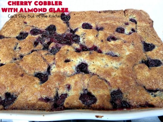 Cherry Cobbler with Almond Glaze | Can't Stay Out of the Kitchen | This lovely #dessert is actually assembled in layers that you don't stir together. It's terrific for #summer #holidays, backyard BBQs & potlucks while #FreshCherries are still in season. #cherries #CherryCobbler #cobbler #CherryDessert #CherryCobblerWithAlmondGlaze #Canbassador #NWCherries #NorthWestCherryGrowers #FavoriteCherryCobbler