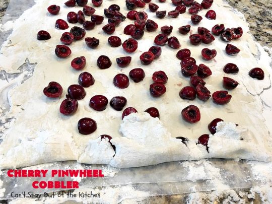 Cherry Pinwheel Cobbler | Can't Stay Out of the Kitchen | this awesome #dessert rolls up #almond flavored #cherries in #PieCrust. A syrup is poured over top before baking. Terrific #CherryDessert while #FreshCherries are in season. #cobbler #CherryCobbler #CherryPinwheelCobbler #Summer #SummerDessert #NorthwestCherryGrowers #NWCherries #Canbassador