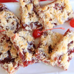 Cherry Shortbread Bars | Can't Stay Out of the Kitchen | These festive & beautiful #cookies are perfect for the #holidays. Whether a #ChristmasCookieExchange, #tailgating or office party, or #potluck, this #CherryDessert is fantastic & will be much enjoyed by all your family & friends. Great for #Thanksgiving, #Christmas or #NewYearsDay. #dessert #CherryPreserves #CherryShortbreadBars