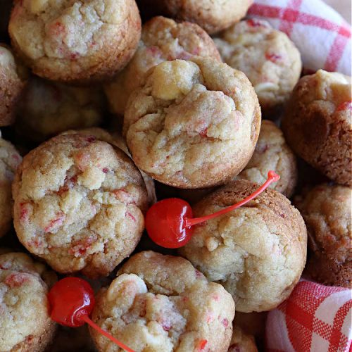 Cherry White Chocolate Cookie Cups | Can't Stay Out of the Kitchen | these fantastic #CookieCups are baked in miniature #muffin tins & are so scrumptious you'll be drooling over every bite. They're sure to cure any sweet tooth craving as they're rich, decadent & heavenly. Perfect for #holiday #baking, a #ChristmasCookieExchange or #tailgating party. #CandiedCherries #WhiteChocolateChips #chocolate #cookies #dessert #CherryDessert #HolidayDessert #CherryWhiteChocolateCookieCups