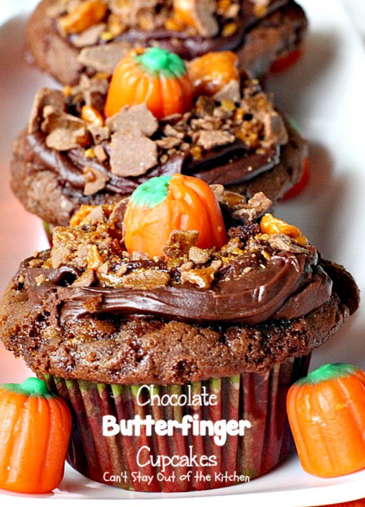 Chocolate Butterfinger Cupcakes | Can't Stay Out of the Kitchen | these fantastic #chocolate #cupcakes are filled with #ButterfingerBites and spread with #Hershey's dark roast chocolate frosting then they're sprinkled with more #butterfinger deliciousness on top! #dessert